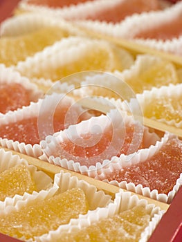 Jellied fruits in paper cases