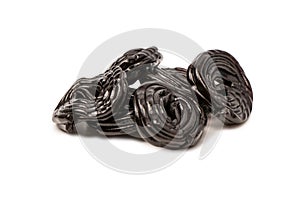 Jelly anise candy isolated on a white background. Black jelly candies. Delicious gelatin candies