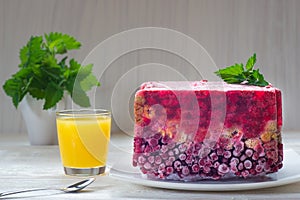 Jelly with berry on white rustic wood background