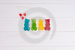 Jelly candies in the form of a multicolored gummy bears with hearts