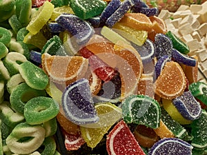 Jelly fruits and traditional turkish delight sweets at market counter