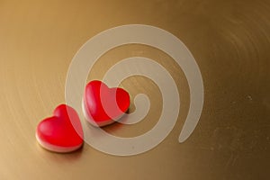 Jelly hearts on the golden metal background. Valentine Day Concept