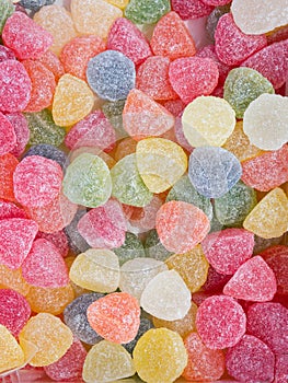 Jelly Marmalade Candies of Various Colors in Shape of Gems. Vivid Multicolored Palette Orange Yellow Green Red Pink Blue. Pattern