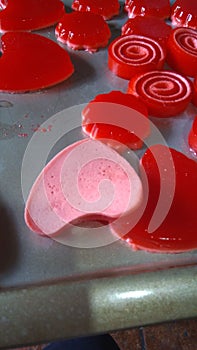 Jelly red heart gummies rollos photo