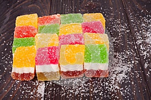 Jelly sweet, flavor fruit, candy dessert colorful on wood background