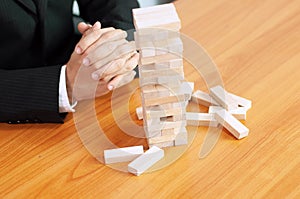 Jenga business game, business fulfillment Building a business base Failed business base Stable and unstable business base.