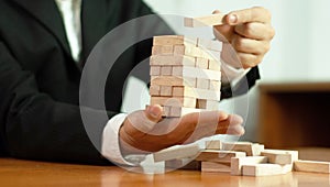 Jenga business game, business fulfillment Building a business base Failed business base Stable and unstable business base.