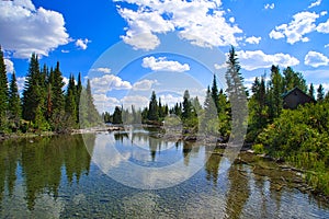 Jenny Lake, many hiking trails, scenic boat rides. Tranquil lake reflections photo