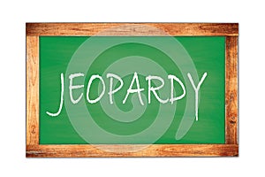 JEOPARDY text written on green school board photo