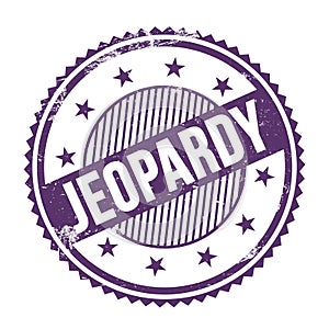 JEOPARDY text written on purple indigo grungy round stamp photo