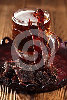 Jerky beef with beer - homemade dried cured spiced meat