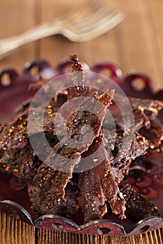 Jerky beef - homemade dry cured spiced meat photo