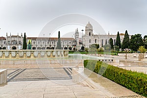 Jardim da Praca do Imperio and Mosterio dos Jeronimos, Lisboa, Portugal photo