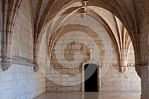 Arches of Jeronimos Monastery Gallery, Belem, Lisbon, Portugal photo