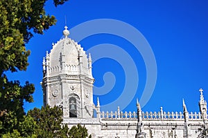 Jeronimos tower against a blue sky