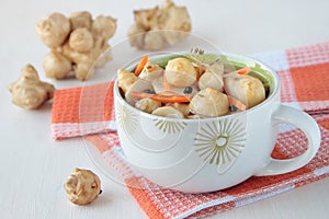 Jerusalem artichokes, marinated with carrots