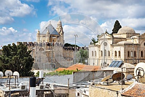 Jerusalem Dormition Abbey church at mount Zion with modern conditioners, satellite dishes and solar panels on the roofs