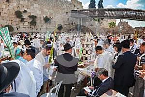 JERUSALEM, ISRAEL - OCTOBER 12, 2014:  The area in front of Western Wall of Temple filled with people. The Jews worship with