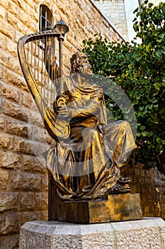 King David statue at Benedictine Dormition Abbey on Mount Zion, near Zion Gate  outside walls of Jerusalem Old City in Israel