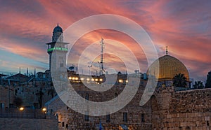 Jerusalem, Israel old city at the Western Wall and the Dome of the Rock at dawn