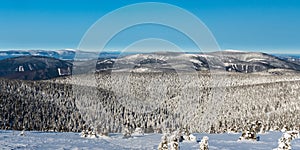 Jeseniky mountains, Kralicky Sneznik and Krkonose mountains from Praded hill in winter Jeseniky mountains in Czech republic