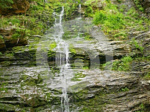 Jeseniky waterfalls forest Vysoky vodopad, aerial drone stream way through stones fairytale summer landscape , beauty of