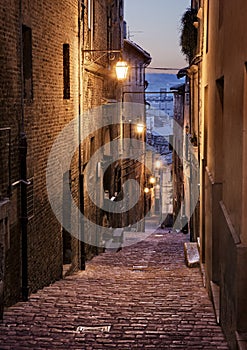 Jesi, Ancona, Marche, Italy: narrow alley at night in the old town