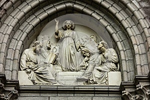 Jesus as wisdom among scholars, bas-relief above the door Chapel Of The Convent Of The Daughters Of Wisdom in