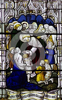 Jesus blessing a child in stained glass