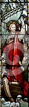 Jesus calming the storm in stained glass photo