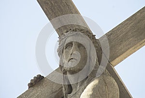 Jesus Christ with cross close up