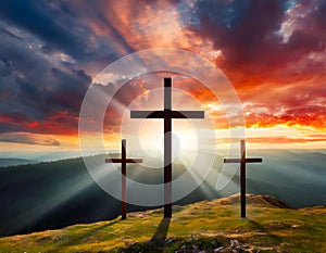 Jesus Christ cross. Easter holiday concept, dramatic light behind three crosses. Christian background, resurrection