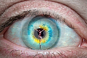 Jesus Christ on the cross reflected in the eye