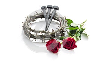 Jesus Christ crown of thorns, nails and two roses.