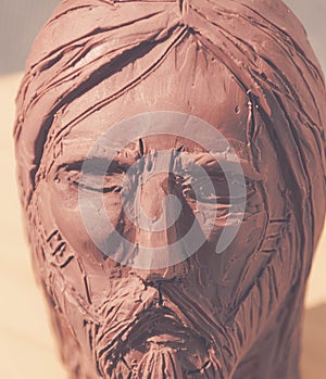 Jesus Christ face clay sculpture