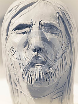 Jesus Christ face clay sculpture