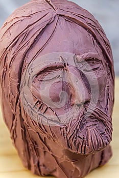 Jesus Christ face clay sculpture