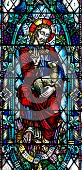 Jesus Christ the good shepherd in stained glass