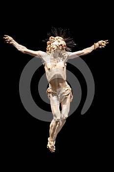 Jesus Christ - Old crucifix, Catholic Church, on black background with copy space