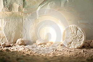 Jesus Christ resurrection. Christian Easter concept. Empty tomb of Jesus with light. Born to Die, Born to Rise. He is