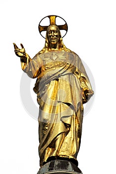 Jesus Christ sacred heart golden statue isolated