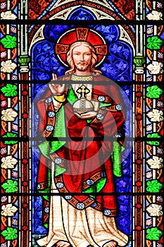 Jesus Christ shown in an image on a stained glass window