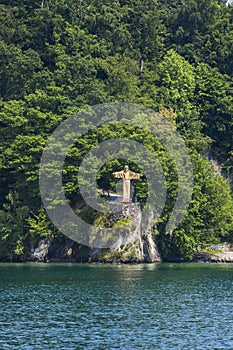 Jesus Christ statue on Lucerne lake in Switzerland