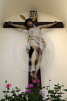 Jesus Christ statue on wall photo