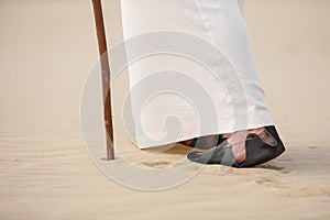 Jesus Christ walking in desert, closeup view