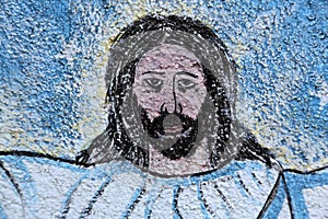 Jesus Christ, wall painting next to the Catholic Church in Kumrokhali, India