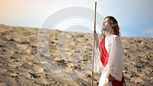 Jesus with closed eyes enjoying sun, mental talk with Father Lord, blessing