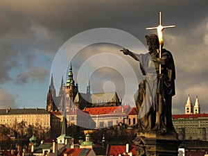 Jesus with cross against Prague Castle