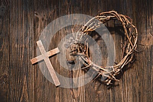 Jesus Crown Thorns and nails and cross on a wood background. Easter Day