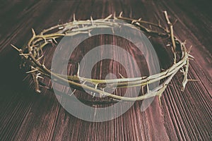 Jesus Crown Thorns on Old and Grunge Wood Background